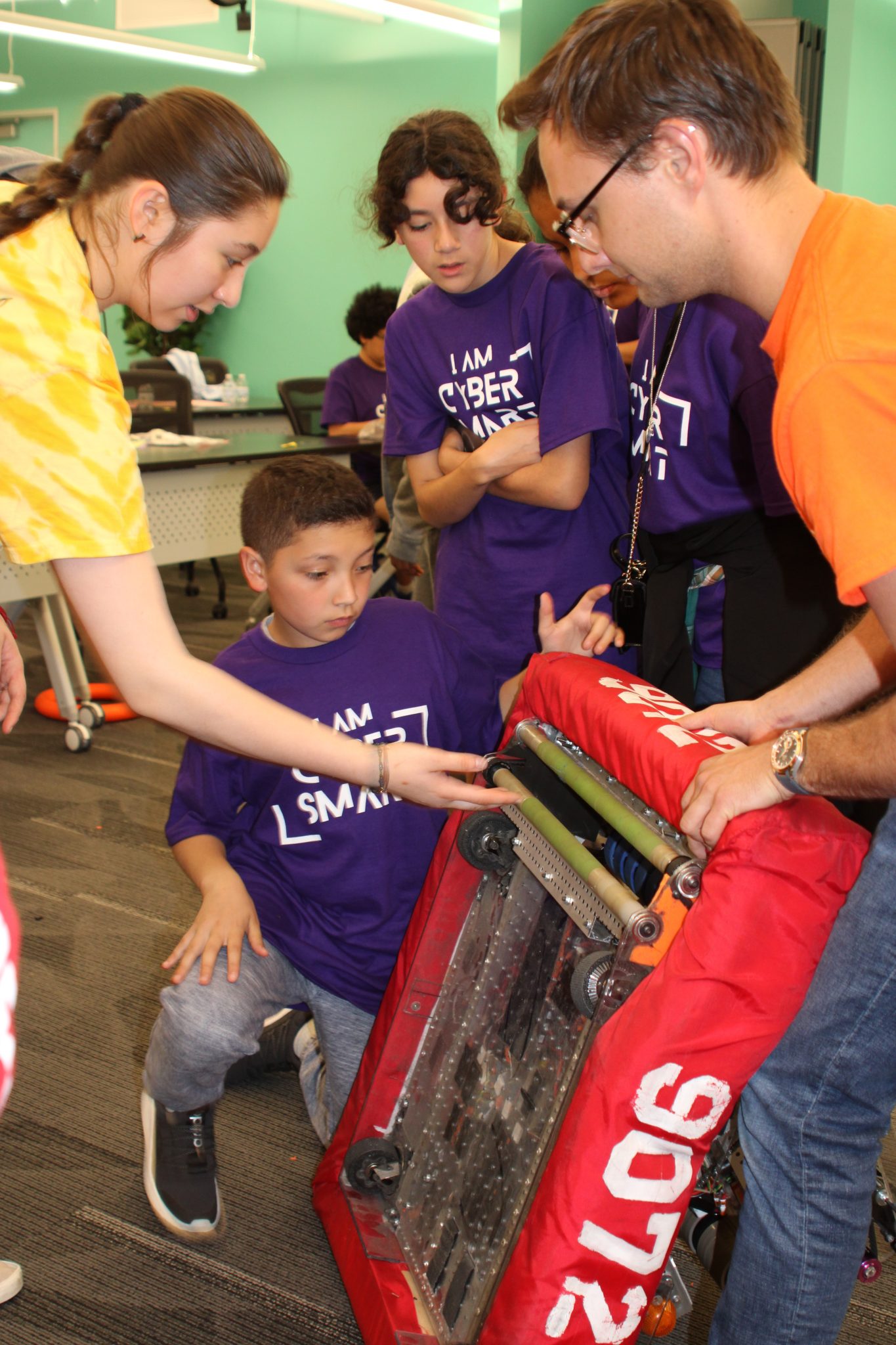 Students learning robotics at NCF's Cyber Saturday