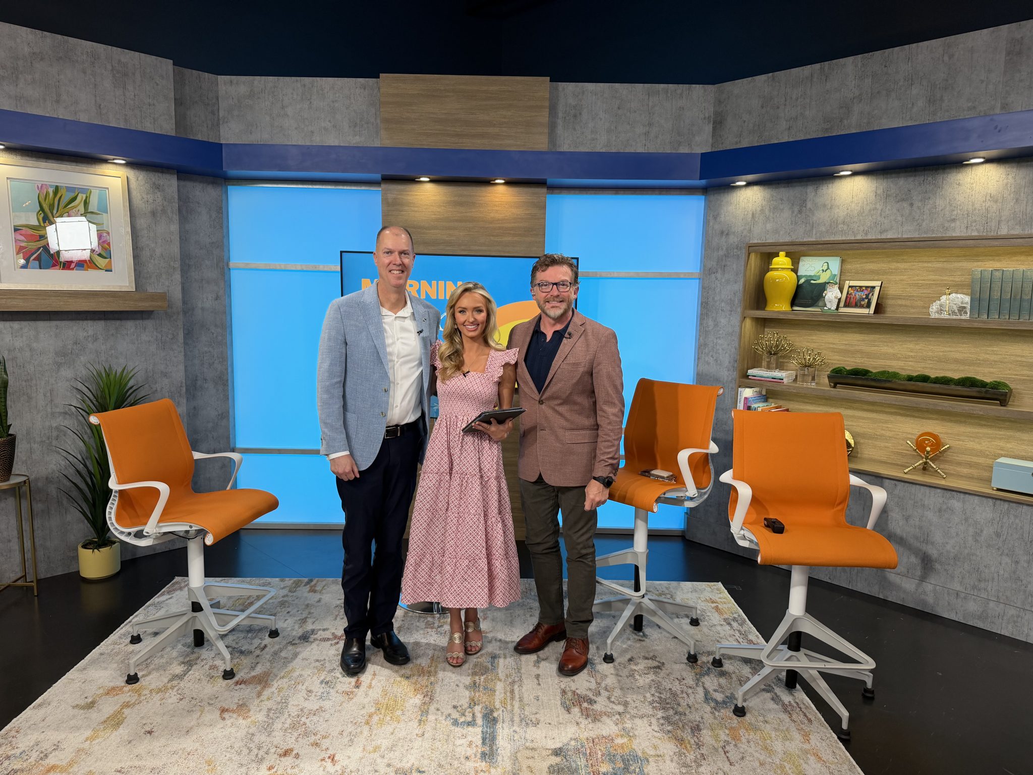 Mary, Cliff and Eric Toler from the Georgia Cyber Center posing for a photo on the WRDW Morning Mix set