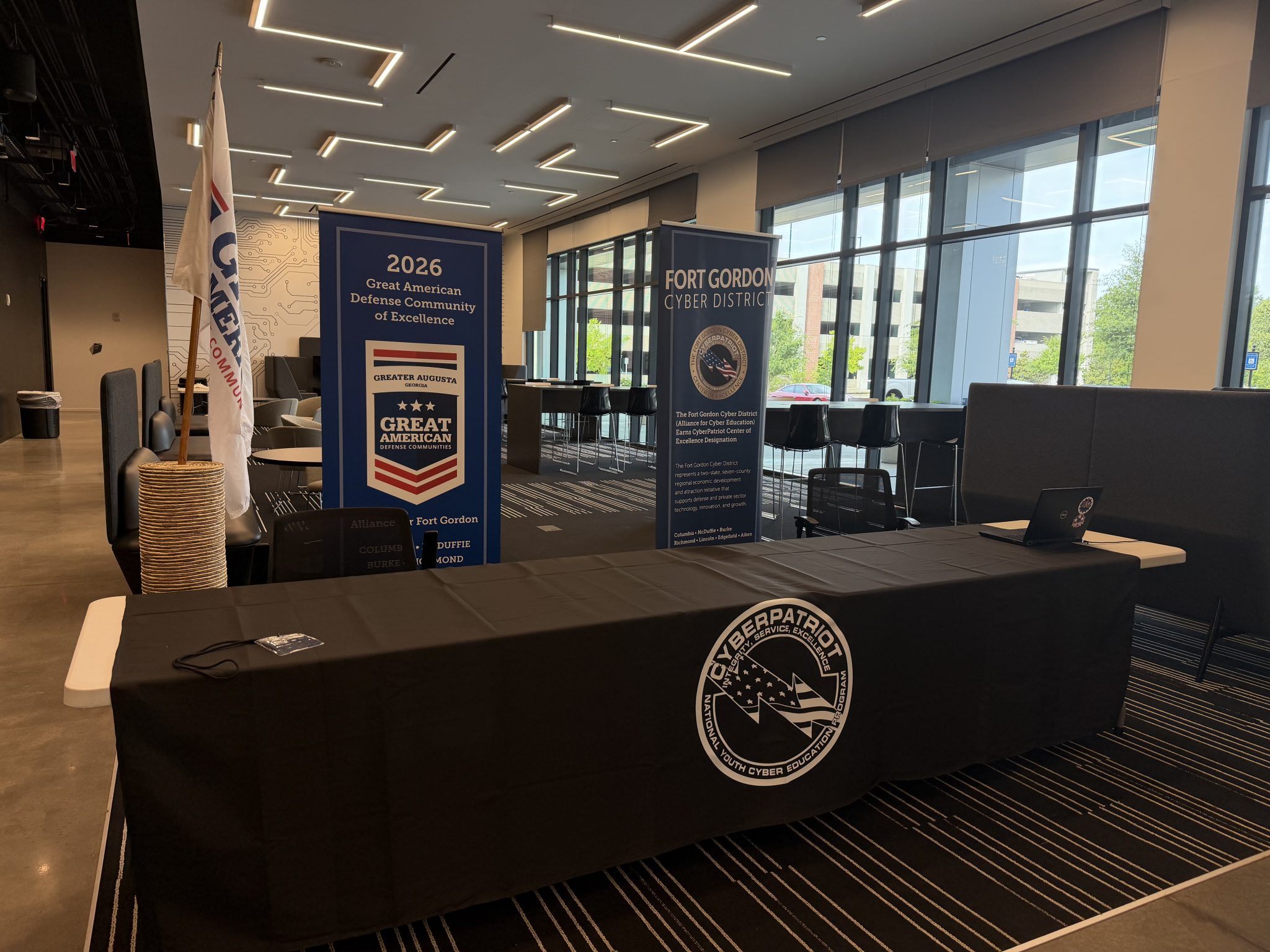 CyberPatriot Camp table hosted by the CSRA Alliance for Fort Gordon in the Georgia Cyber Center lobby