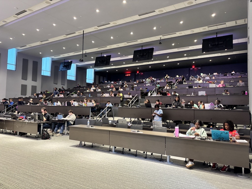 Middle school students in Plug n Play auditorium for CyberPatriot Camp at the Georgia Cyber Center at Augusta University