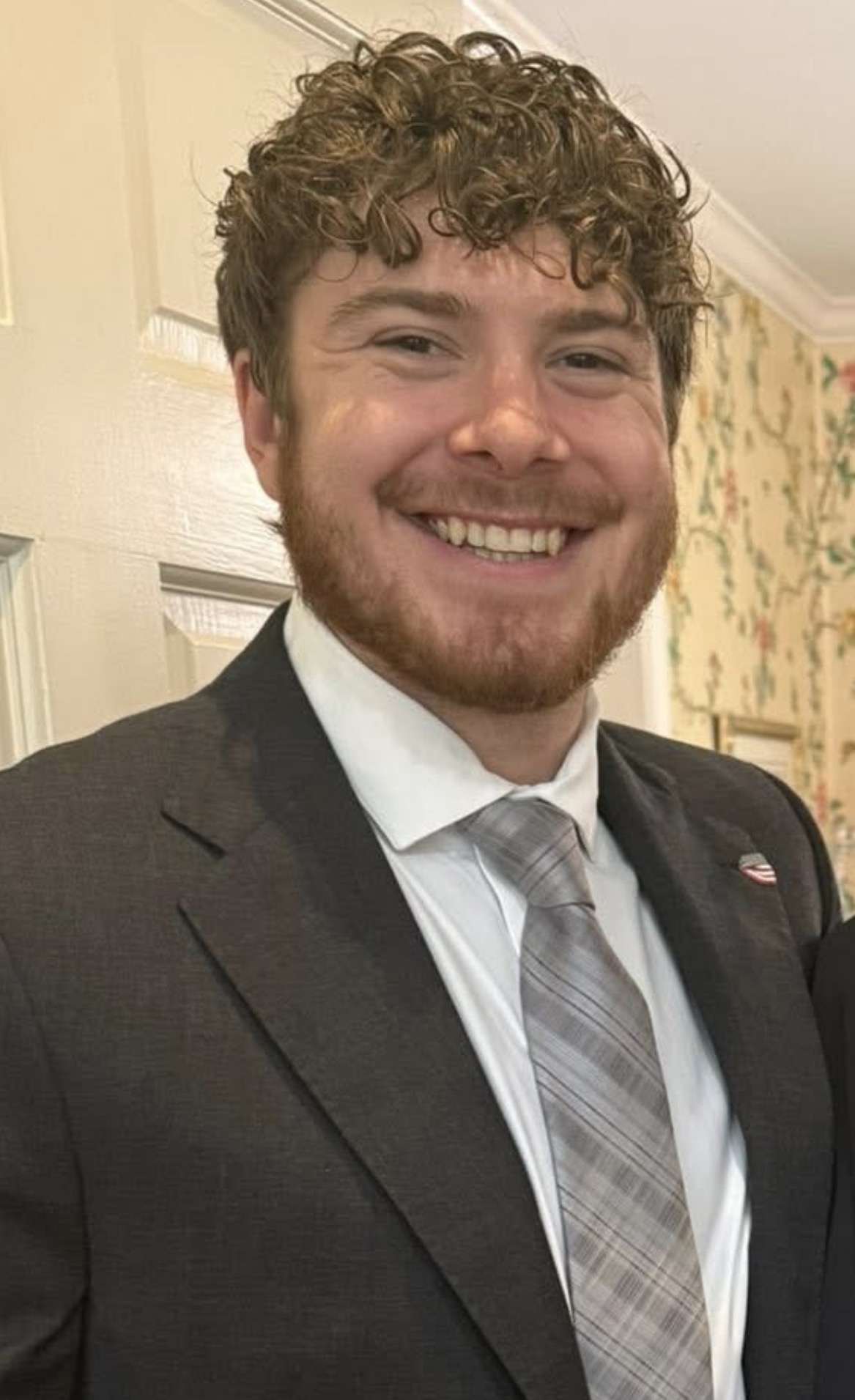Colby Masters, a Georgia Cyber Center at Augusta University graduate in a suit