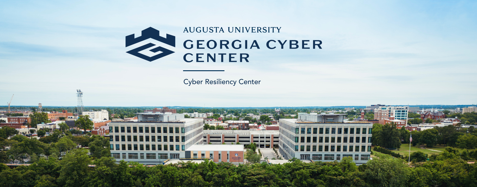 Augusta University's Georgia Cyber Center: Cyber Resiliency Center logo overlaying photo of the buildings from the Savannah River