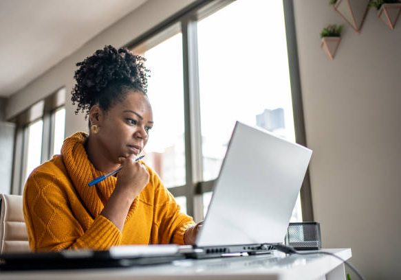 Black woman working from home office